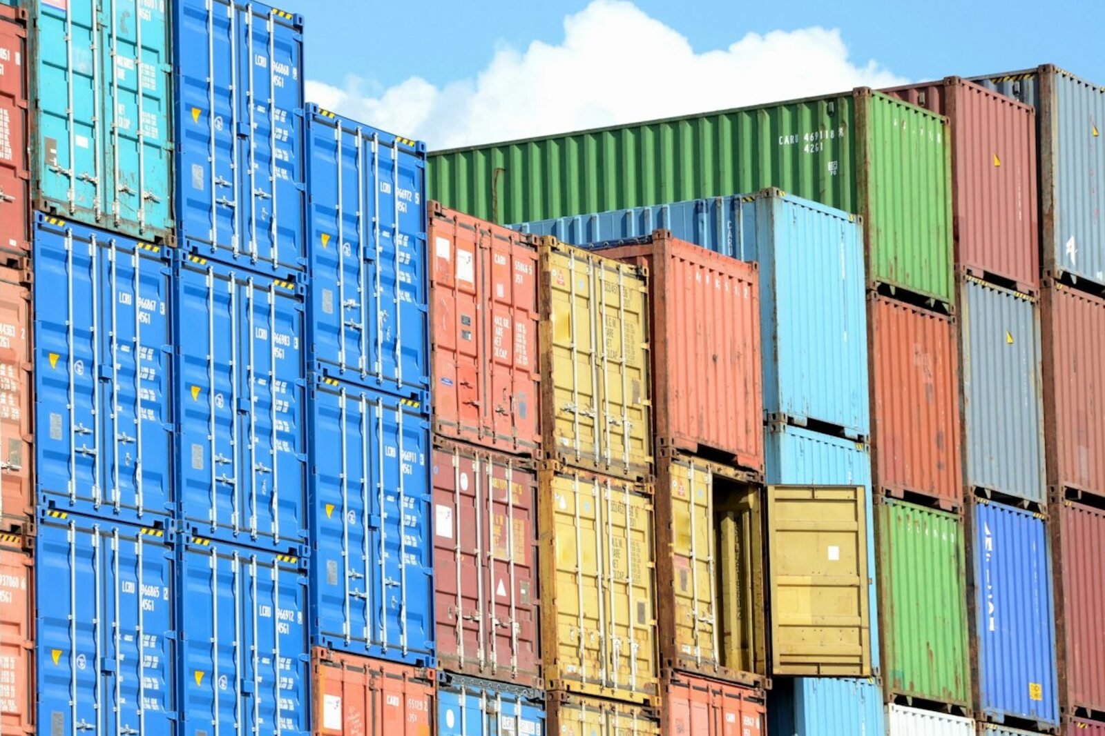 Colourful sea containers stacked at a terminal